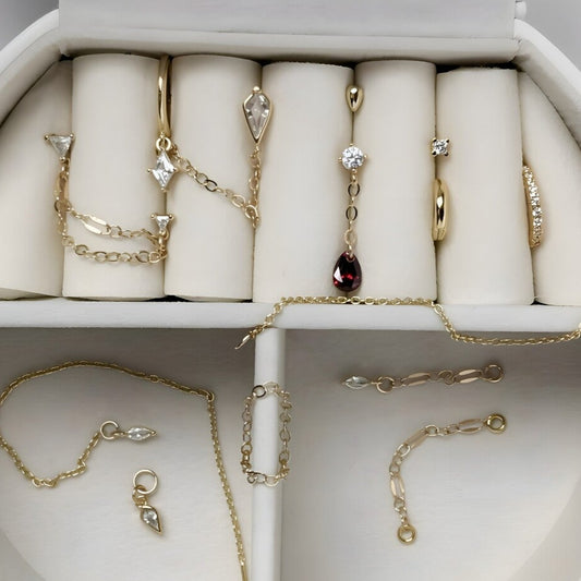 12 earrings + 4 charms + jewelry box. Whole set.
