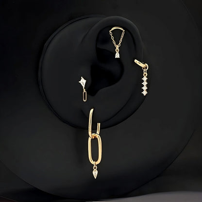 Curated øre set av 4 øredobber i gull