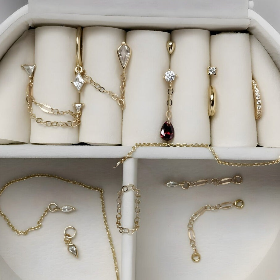 12 earrings + 4 charms + jewelry box. Whole set.