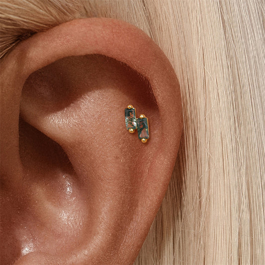 Cartilage helix earring in gold with moss agate stones