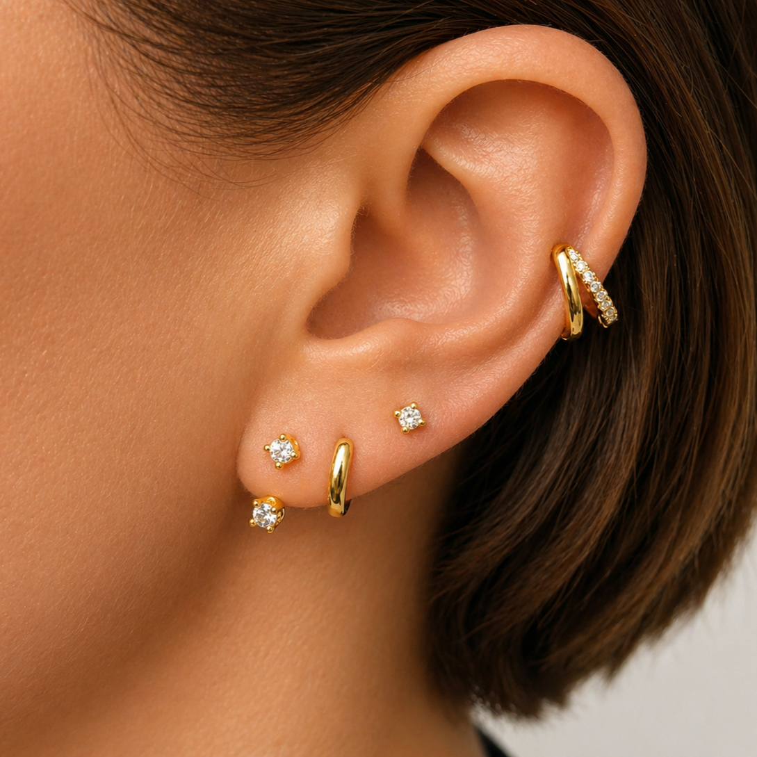 earrings stacked on ear