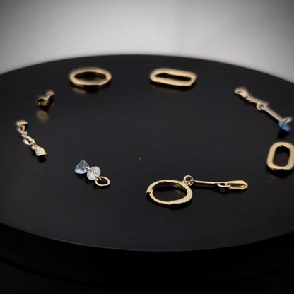 Sett med 4 øredobber med hoops og flatback
